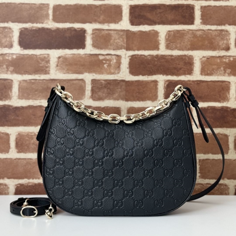 G*u*i top handle bags